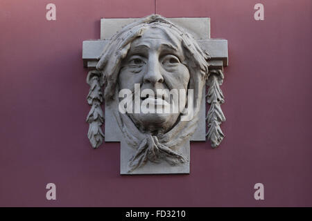 One of the Four Feelings decorative reliefs on the facade of Sao Joao National Theatre in Porto Stock Photo