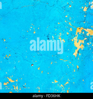 Creative beautiful blue background, blue spray paint on concrete with cracks and scratches. Landscape style. Grungy concrete sur Stock Photo