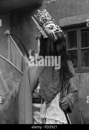Old Han Ground Opera performer in costume BW, Liuguan Old Han Village, Guizhou Province, China Stock Photo