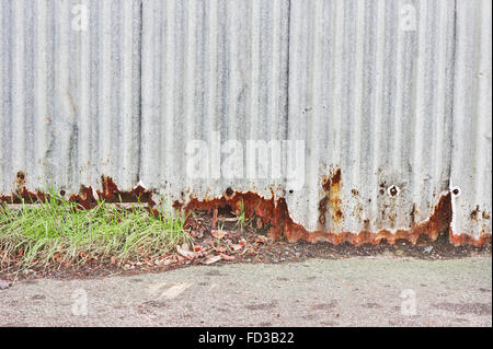 Part of a rusty metal wall as a background Stock Photo