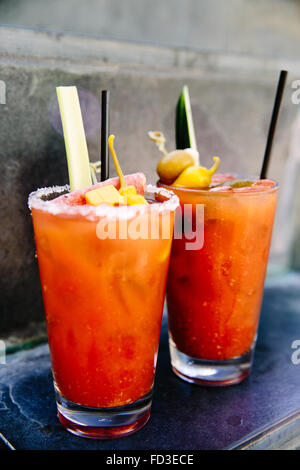 Freshly made Bloody Marys with all the fixings will cure anything! Stock Photo