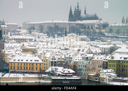 View of Prague Castle and Lesser town rooftops in Prague in winter, Czech Republic, Europe Stock Photo