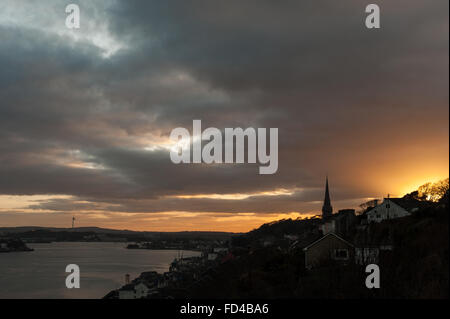 Sun sets over Cobh Cathedral, Cobh, County Cork, Ireland. Stock Photo