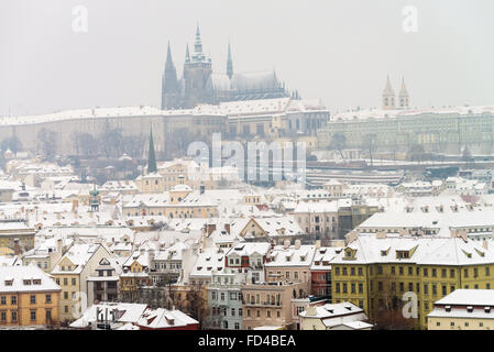 View of Prague Castle and Lesser town rooftops in Prague in winter, Czech Republic, Europe Stock Photo