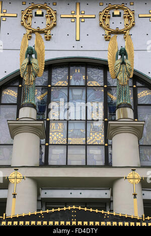 Statues of angels designed by Othmar Schimkowitz. In the window, a work of Kolo Moser called 'the Fall.' Steinhof Church built b Stock Photo