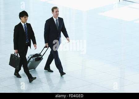 Businessmen at the airport Stock Photo