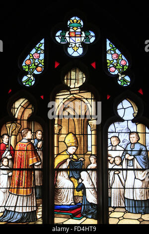 Stained glass window. St. Bernadette. The Chapel of the Immaculate Conception. Stock Photo