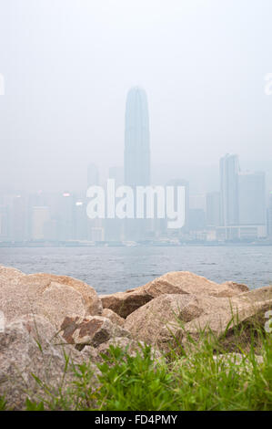 IFC skyscraper in Hong Kong's Central district obscured by air pollution Stock Photo