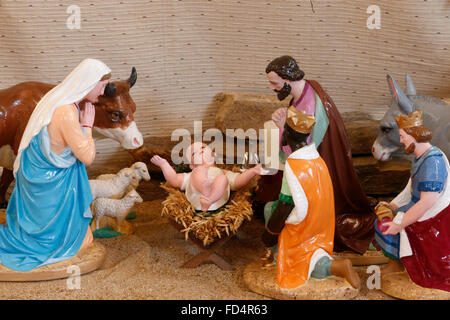 Christmas crib in a caholic church. Nativity scene. Stock Photo