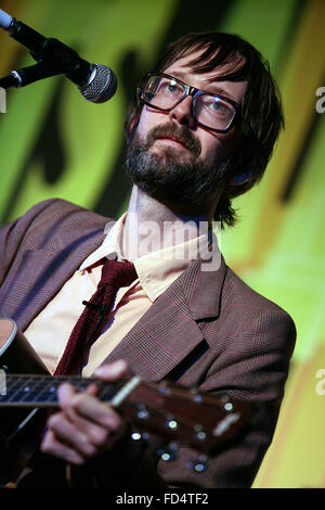 Jarvis Cocker sings one of his Pulp songs to demonstrate a point during his keynote speech at the Midland Hotel. Stock Photo