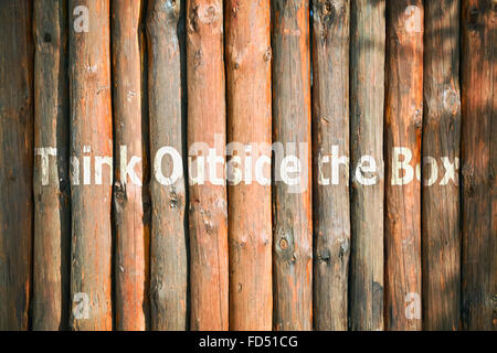 Text Think Outside The Box written on wooden background Stock Photo