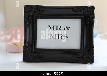 Black Mr and Mrs Wedding Framed Sign Stock Photo