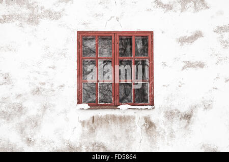 Old wooden window in white stone wall, background photo texture Stock Photo