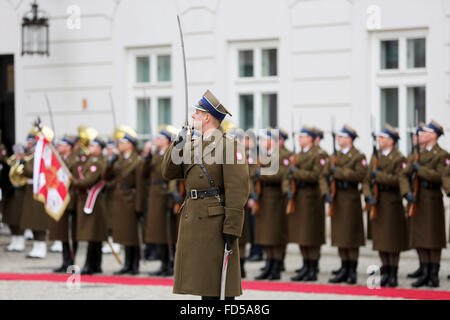 Warsaw, Poland. 28th Jan, 2016. A Polish soldier salutes during the official welcoming ceremony of the Croatian President to the Presidential Palace in Warsaw. Croatian President, Kolinda Grabar-Kitarovic met with Polish President Andrzej Duda in the Presidential Palace in Poland's capital, Warsaw during her official visit to Poland. Credit:  PACIFIC PRESS/Alamy Live News Stock Photo