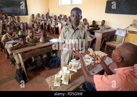 School kit distribution in an African primary school. Stock Photo