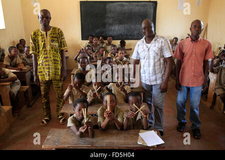 School kit distribution in an African primary school. Stock Photo