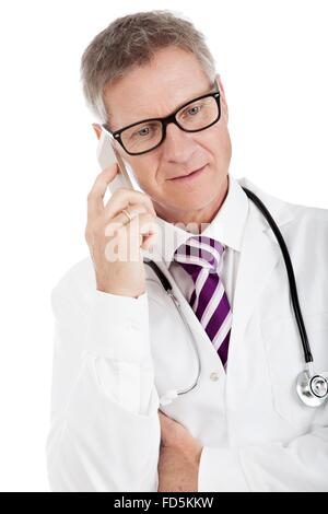 White Medical Doctor with Eye Glasses Seriously Calling Through Phone, on White Background Stock Photo