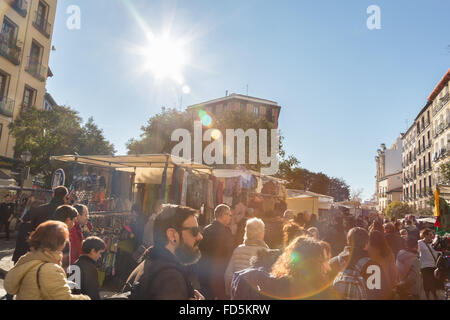 Madrid, Spain - Jan 24, 2016:  People visiting el Rastro, sunday  flea market, on January 24th, 2016 in Madrid, Spain. El Rastro Stock Photo