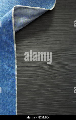 blue jeans texture on wooden background Stock Photo