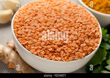 Dried red lentils in a bowl Stock Photo