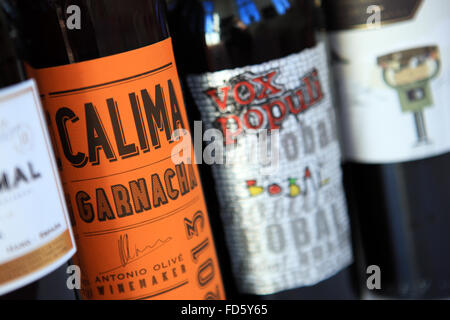 Bottles of red wine with interesting labels Stock Photo