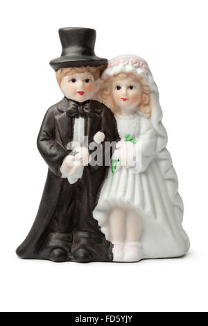 Old plaster bride and groom cake topper isolated on white background Stock Photo