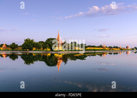 Mandalay, Myanmar at the castle moat. Stock Photo