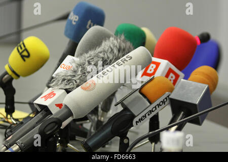 Microphones on a table during press-conference Stock Photo