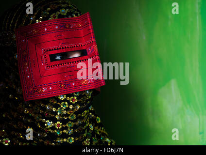 a bandari woman wearing a traditional mask called the burqa, Hormozgan, Minab, Iran Stock Photo