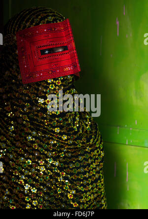 a bandari woman wearing a traditional mask called the burqa, Hormozgan, Minab, Iran Stock Photo