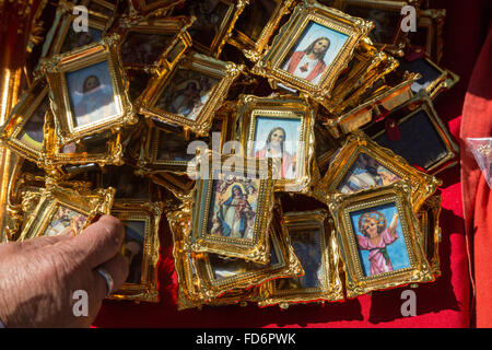Religious icons and images of saints on sale for Mexican pilgrims and penitents at the Sanctuary of Atotonilco an important Catholic shrine in Atotonilco, Mexico. Stock Photo
