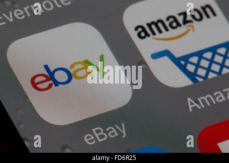 Internet shopping apps, ebay and amazon, on an iphone 6 screen Stock Photo