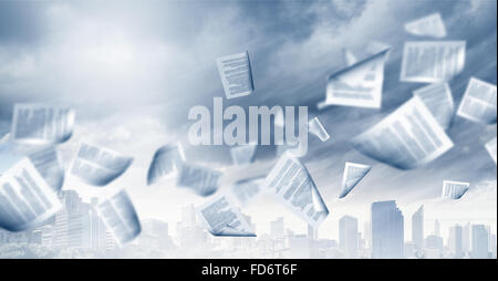 Background conceptual image with papers flying in air Stock Photo