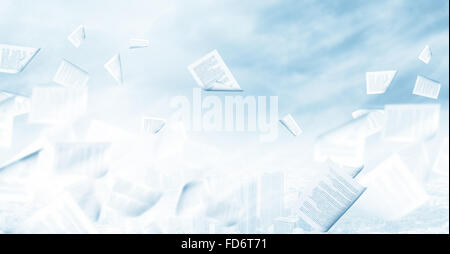 Background conceptual image with papers flying in air Stock Photo