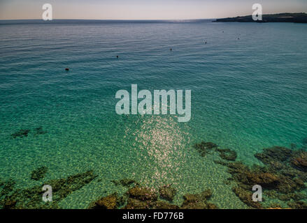 beach facilities on bay near rocky cove on the coast of Salento in ...