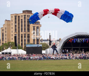 A member of the RAF falcons parachute display team makes a landing on Southsea common, Portsmouth Stock Photo