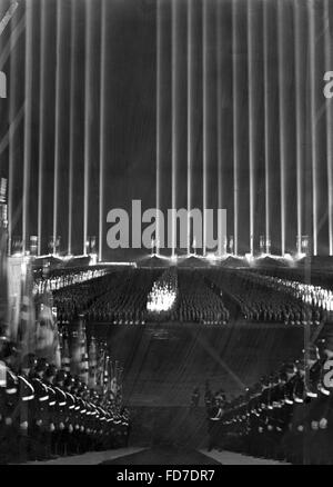 SS-Leibstandarte Adolf Hitler during the Cathedral of Light at the Nuremberg Rally, 1937 Stock Photo