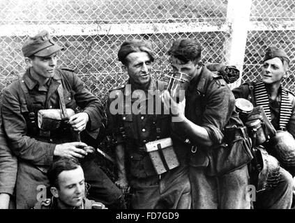 Wehrmacht soldiers take a break during the retreat, 1944 Stock Photo ...
