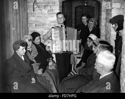 Citizens of Berlin in a bomb shelter, 1940 Stock Photo