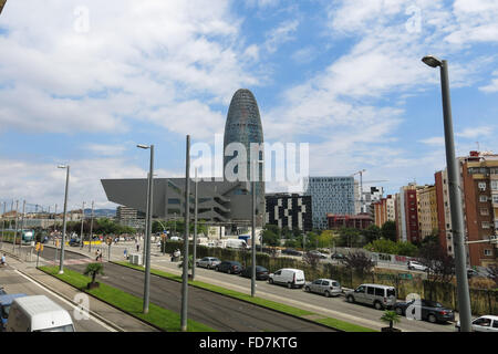 BARCELONA, SPAIN - AUGUST 1, 2015: Disseny Hub Barcelona museum and Torre Agbar on August 1, 2015 in Barcelona, Spain. Torre Agb Stock Photo