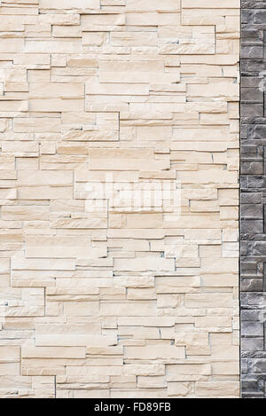 Pattern from lite brown decorative slate stone wall surface. For use as background. Stock Photo