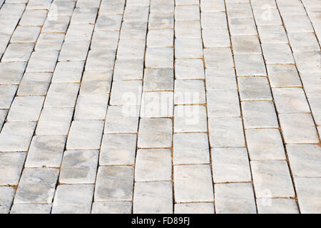 Abstract background of cobble stones making from stone blocks. Old texture background. Stock Photo