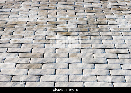 Abstract background of cobble stones making from stone blocks. Old texture background. Stock Photo