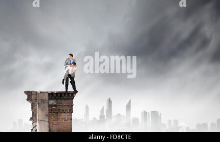 Businessman riding on back of his colleague Stock Photo