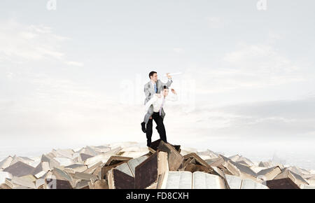 Businessman riding on back of his colleague Stock Photo