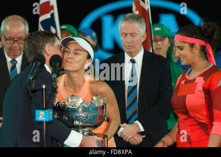 Melbourne, Australia. 29th Jan, 2016. The winners of the Ladies Doubles Martina Hingis of Switzerland and Sania Mirza of India accept their trophy on day twelve of the 2016 Australian Open Grand Slam tennis tournament at Melbourne Park in Melbourne, Australia. Sydney Low/Cal Sport Media/Alamy Live News Stock Photo