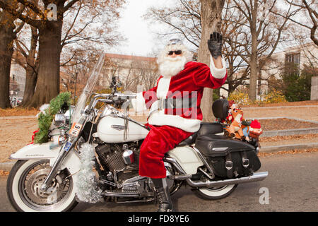 Santa Claus riding a Harley Davidson motorcycle - USA Stock Photo