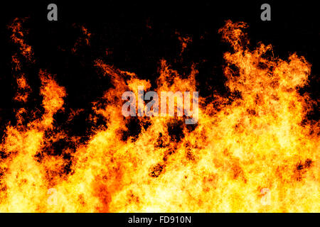 Raging fire shot at a high shutter speed to freeze the motion of the flames Stock Photo