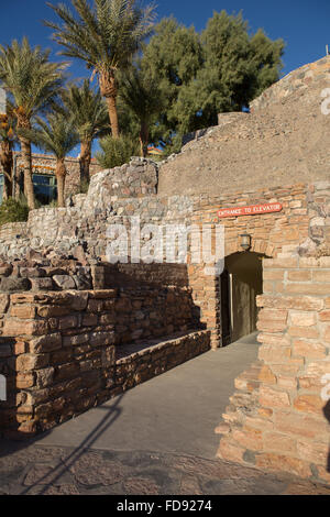 Entrance tunnel from parking lot under the Furnace creek inn Death Valley California. leading to the elevators and hotel lobby. Stock Photo