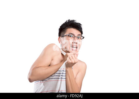 Portrait of young man horrified Stock Photo